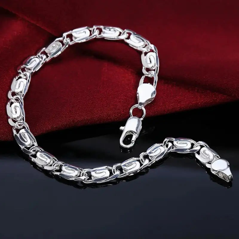 925 sterling silver byzantine scroll-link chain bracelet with a lobster clasp