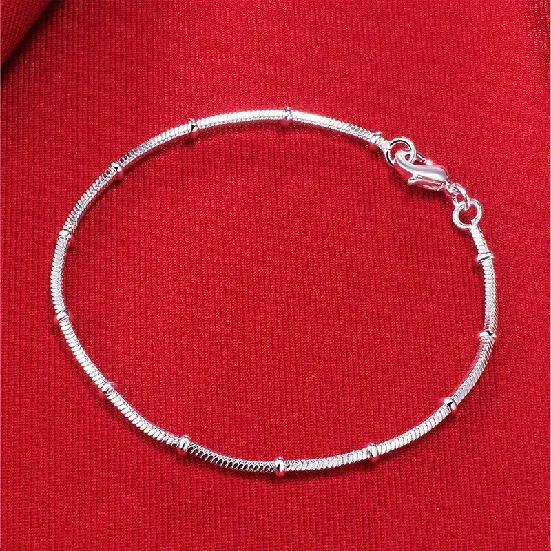 925 sterling silver thin snake chain bracelet with polished bead stations