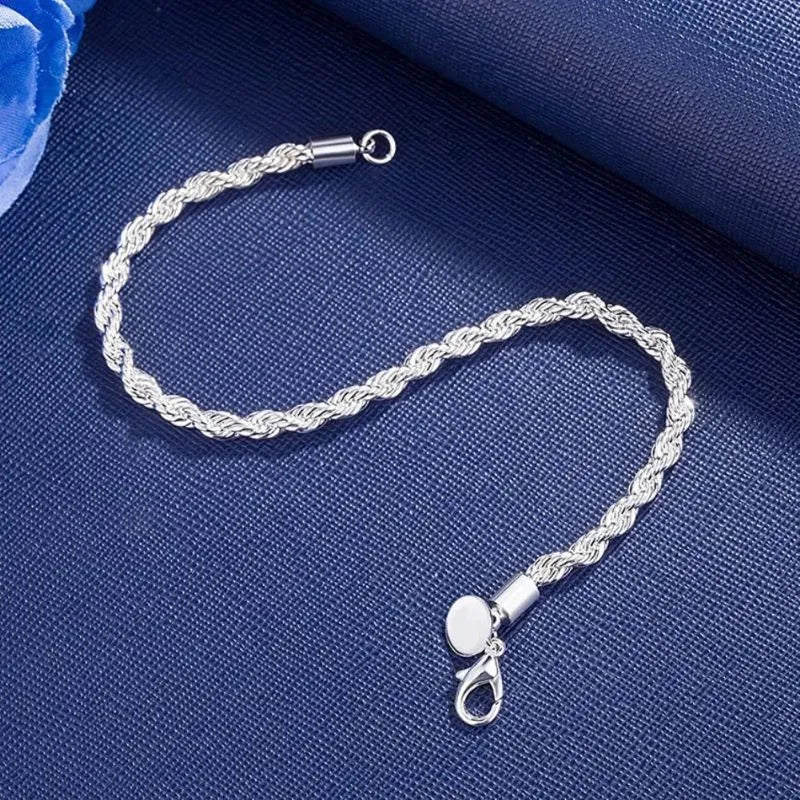 Classic sterling silver rope bracelet for men with a secure lobster clasp and polished finish.