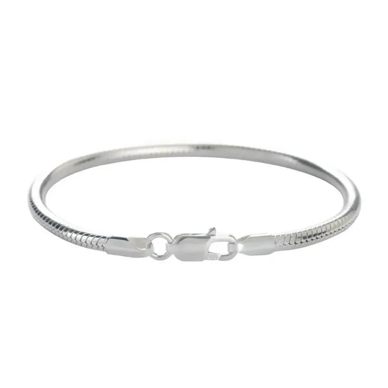 Detailed view of the Signature Snake Chain Bracelet showcasing its flexible 925 sterling silver construction.