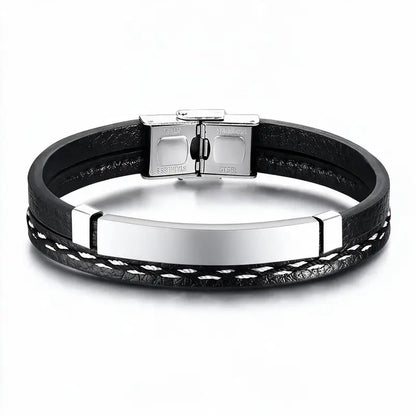 Crest leather bracelet with blank silver ID plate, on a plain white background.