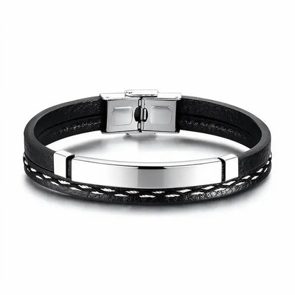Crest black leather bracelet with silver ID plate, product photo on white background.
