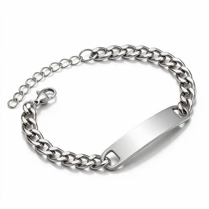Forge silver chain link bracelet with engraved ID plate and adjustable extension chain, unclasped, product photo on white background.