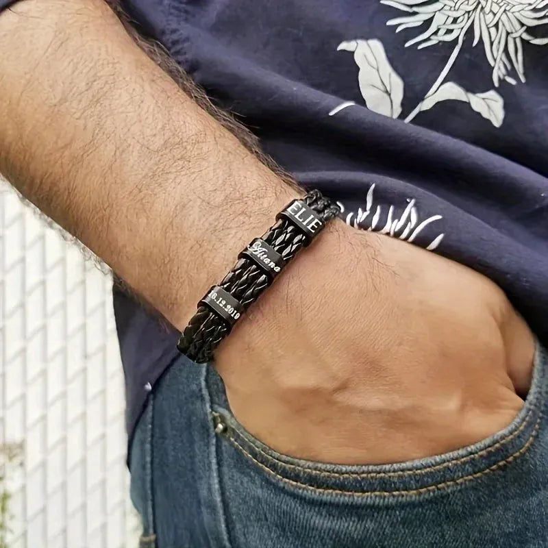 Man wearing the Customised Men's Bracelet – Heritage Family Names Bracelet with three engraved name and date beads.