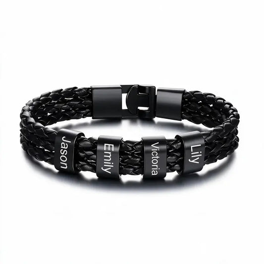 Heritage leather bracelet with engraved name plates, product photo on white background.