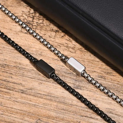 Silver and Black versions of the Customised Men's Bracelet – Kinship Box Chain Bracelet shown together.