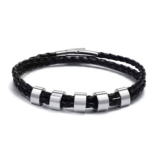 Lineage black braided leather bracelet with 5 engraved name plates, product photo on white background.