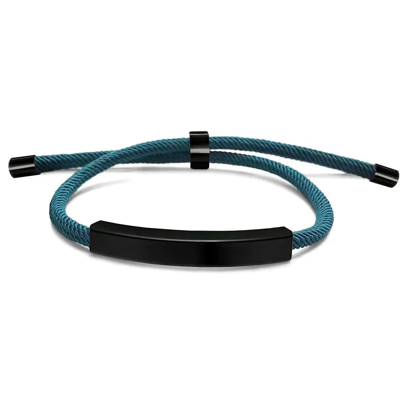 Voyager adjustable cord bracelet in blue with black-tone nameplate