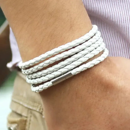 White braided leather bracelet wrapped five times around the wrist