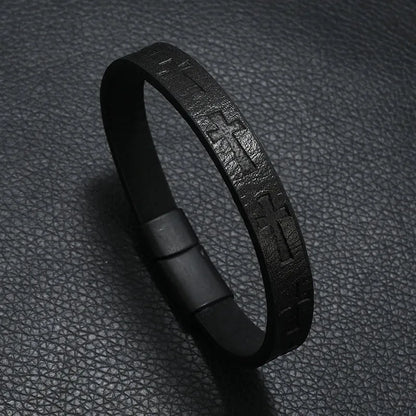 Black leather bracelet with an embossed cross pattern and magnetic clasp