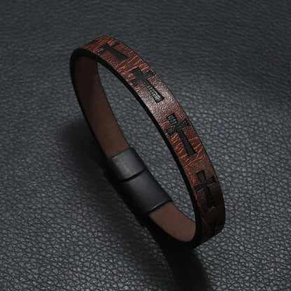 Brown leather bracelet with an embossed cross pattern and magnetic clasp