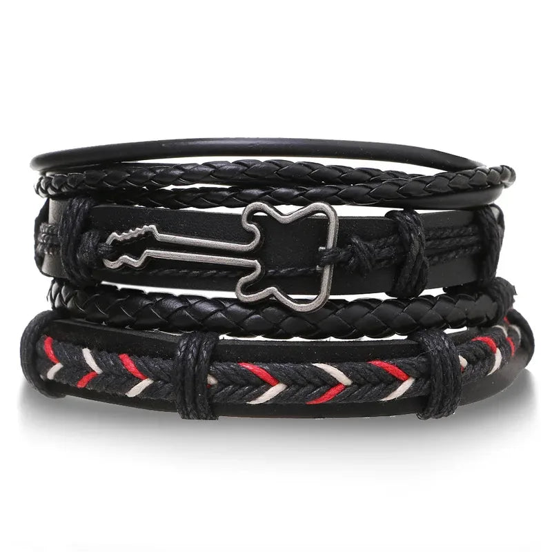 Black leather layered bracelet stack with a silver guitar charm and red-and-white embroidered thread accent, on a white background.