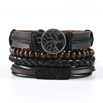 Brown leather layered bracelet stack with a tree of life charm and brown wood beads, on a white background.