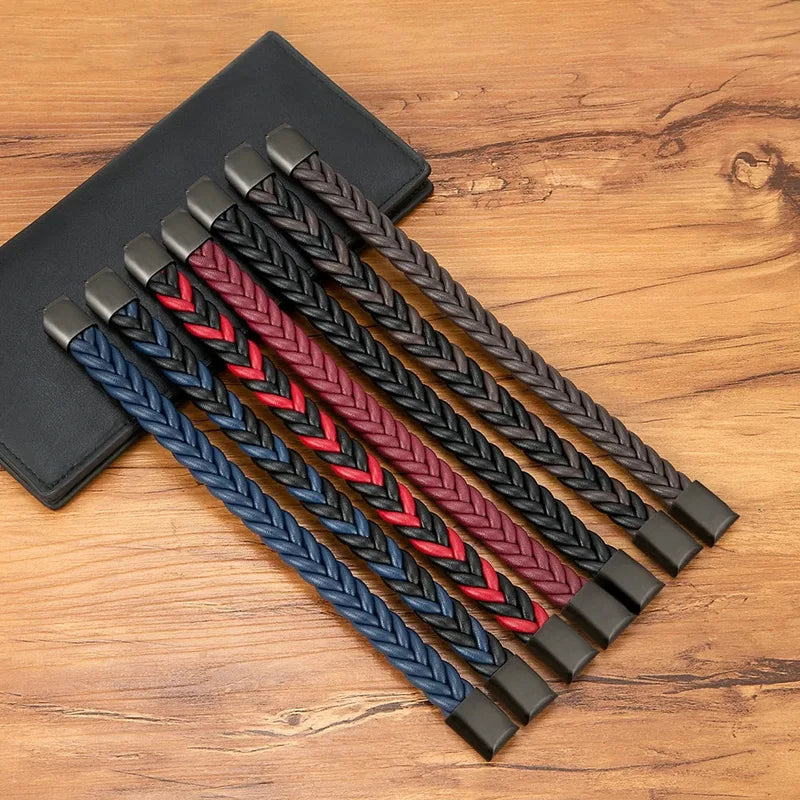 Seven leather herringbone braid bracelets in black, blue, red, brown, and mixed two-tone colorways, laid out together