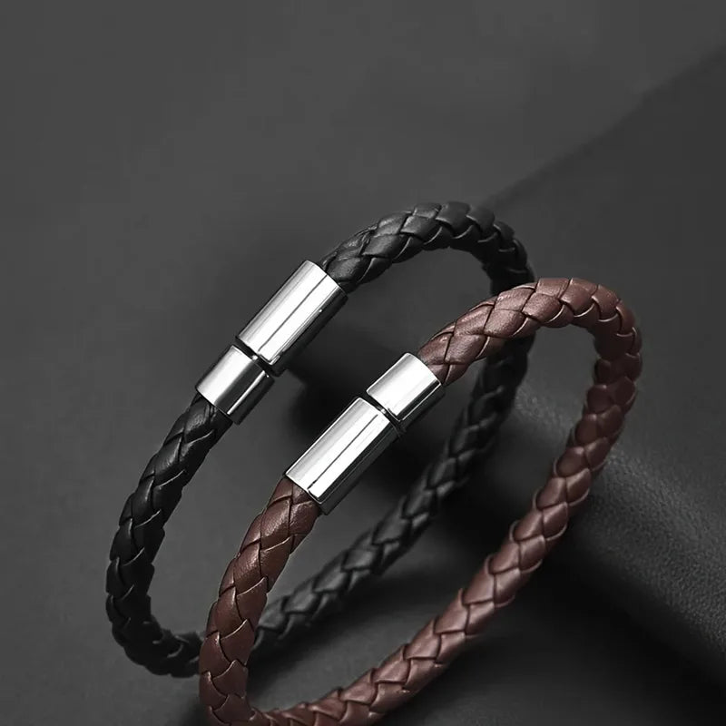 Black braided leather bracelet with a stainless steel magnetic clasp, on a white background