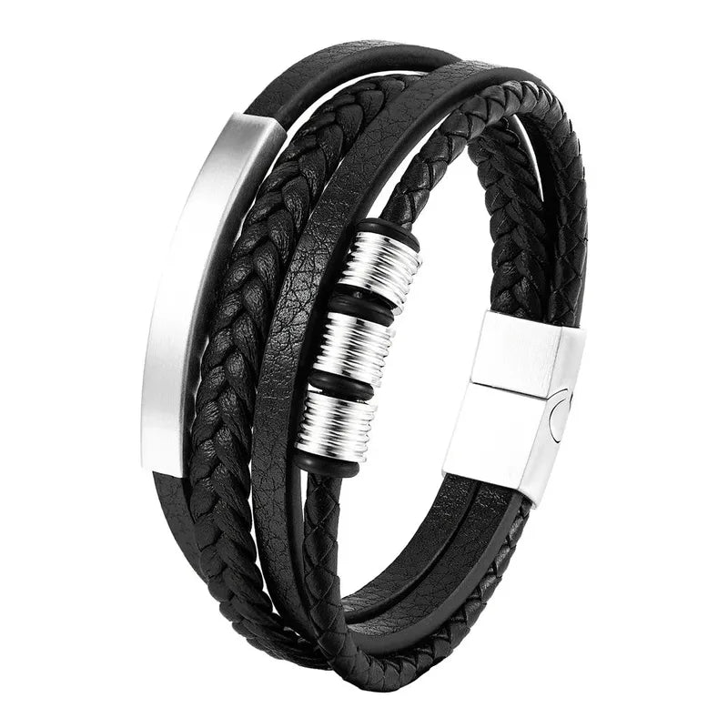 Multi-strand silver leather bracelet with a metal bar and silver ring discs, on a white background
