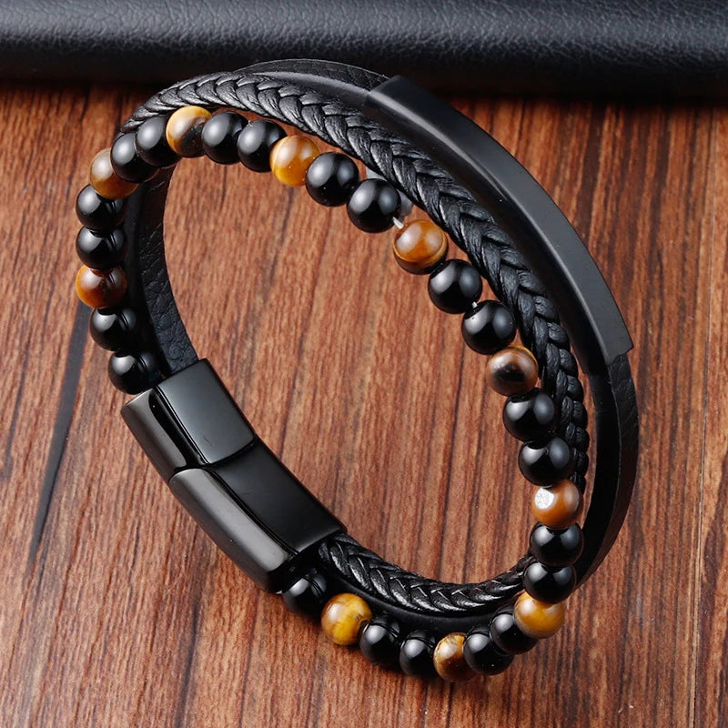 Multi-strand black leather bracelet with gold tiger eye beads and black beads