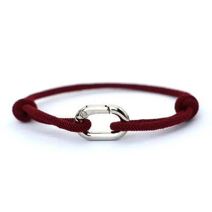 Burgundy nylon cord bracelet with an alloy spring-clip clasp