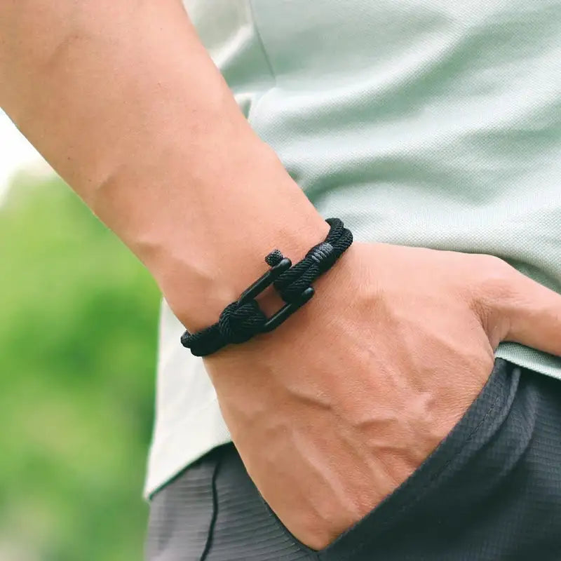 Men Bracelet Rope – Helm Shackle Rope Bracelet in black, worn on the wrist
