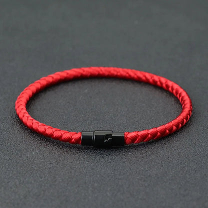 Red braided cord bracelet with a black stainless steel barrel clasp
