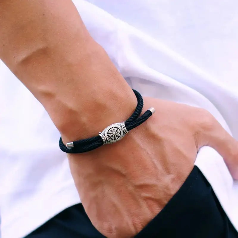 Black Vegvisir rune bracelet worn on the wrist