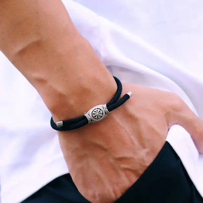 Black Vegvisir rune bracelet worn on the wrist