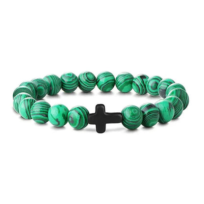 Green malachite bead bracelet with a small black cross bead