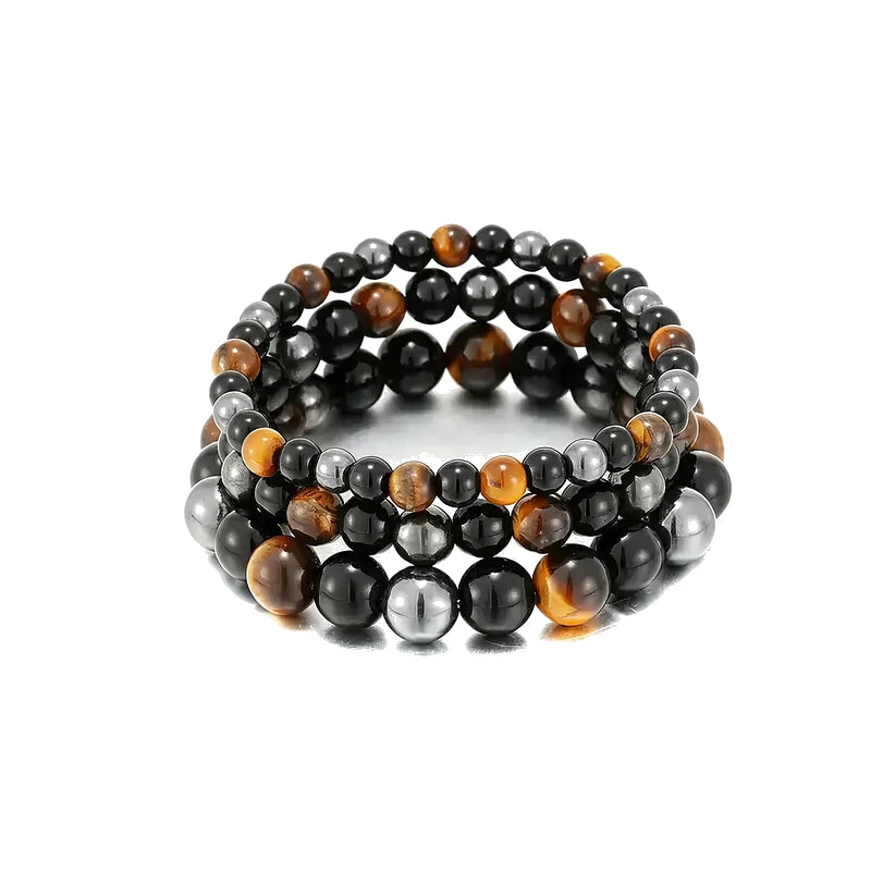 Three stacked bead bracelets combining tiger eye, black obsidian, and hematite beads, on a white background.