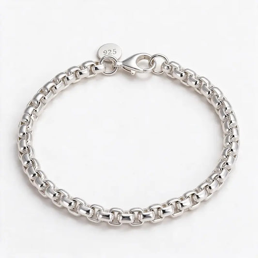6mm polished stainless steel rounded box-link rolo chain bracelet with a 925 tag near the clasp, product photo on white background