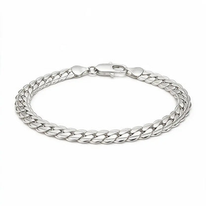 Silver flat curb chain bracelet with diamond-cut texture and lobster clasp, product photo on white background