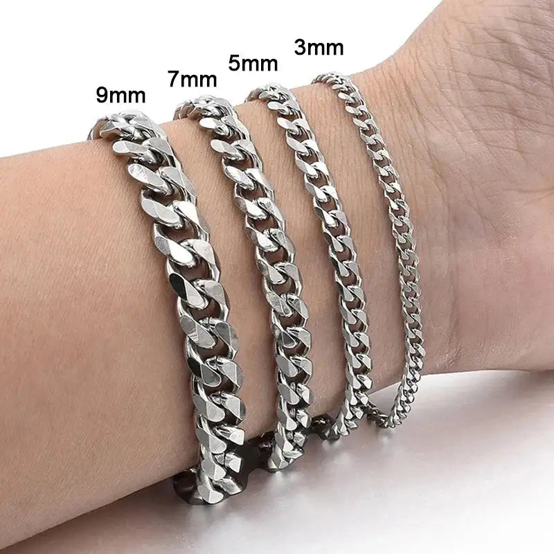 Silver Cuban link chain bracelets in 3mm, 5mm, 7mm and 9mm widths compared on the wrist