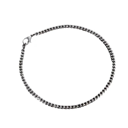 Silver Cuban link chain bracelet in 3mm width, product photo on white background