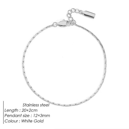 White gold-tone hammered wire chain bracelet laid flat on a white background, labeled Stainless steel, 20+2cm length, 12×3mm pendant size, White Gold colour.