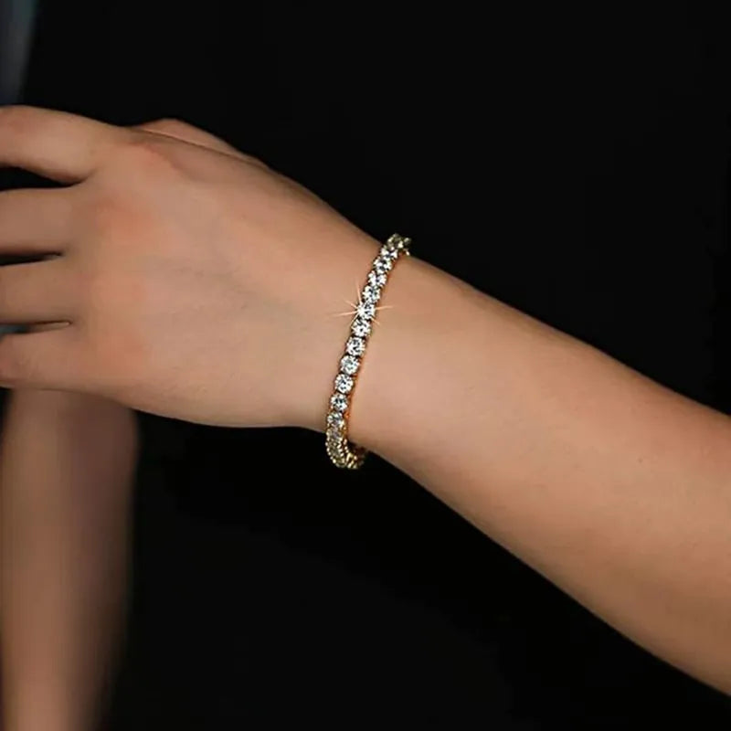 Crown Tennis Bracelet crafted with premium cubic zirconia stones and a polished gold-tone finish.