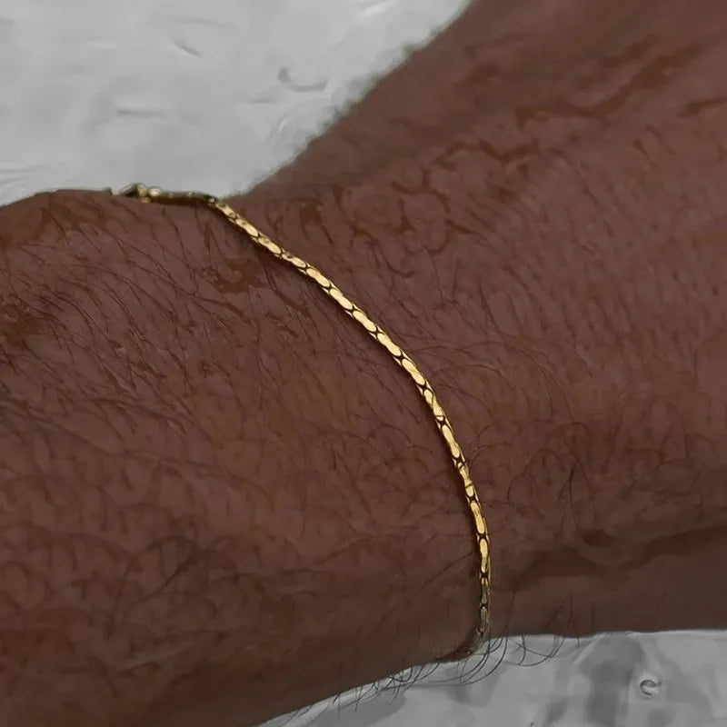 Luxury Men's Bracelet Gold featuring an ultra-slim wire chain with a refined minimalist design.
