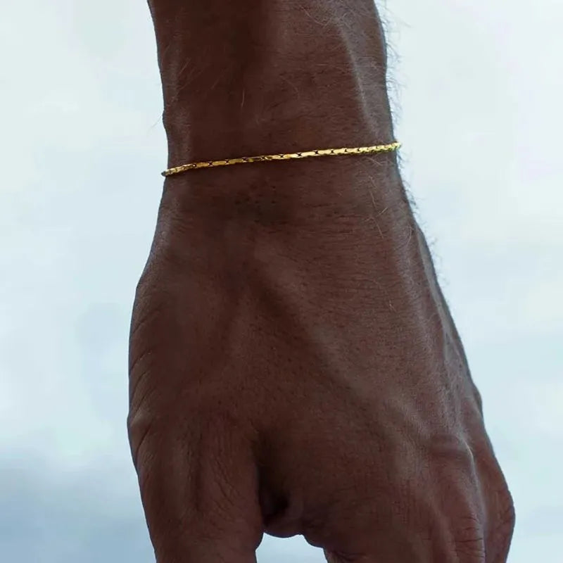 Minimalist gold wire bracelet designed for comfortable everyday wear and timeless style.