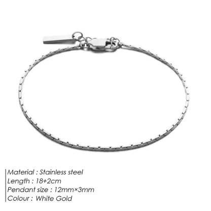 White gold-tone wire chain bracelet laid flat on a white background, labeled Stainless steel, 18+2cm length, 12mm×3mm pendant size, White Gold colour.