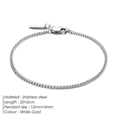 White gold curb chain bracelet with labelled specifications: stainless steel, 20+2cm length, 12mm x 3mm pendant