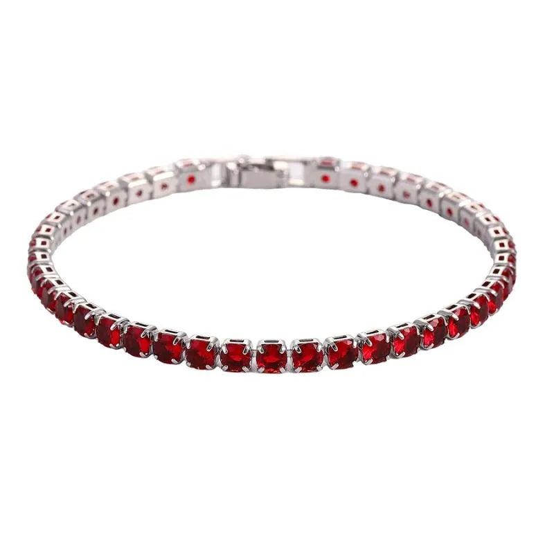 Premium gold tennis bracelet featuring a secure fold-over clasp and sparkling geometric crystal design.