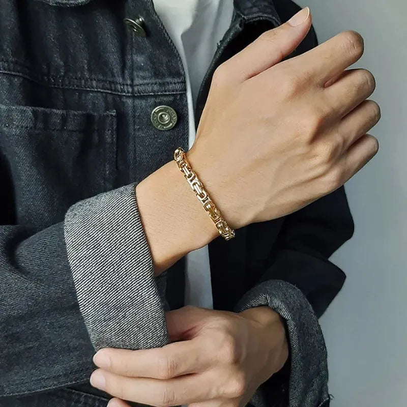 Monarch Byzantine Bracelet showcasing a polished gold 316L stainless steel chain for timeless everyday style.