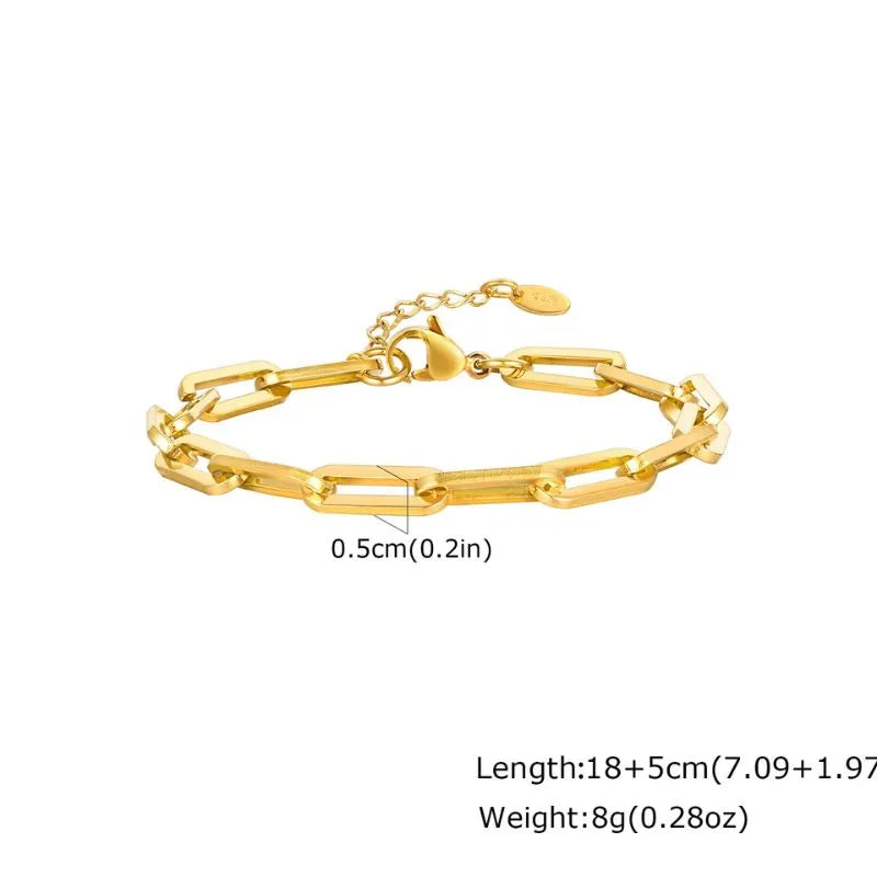 Thin gold box chain bracelet with a small rectangular bar charm, dimensions labelled: 21+5cm length, 7g weight