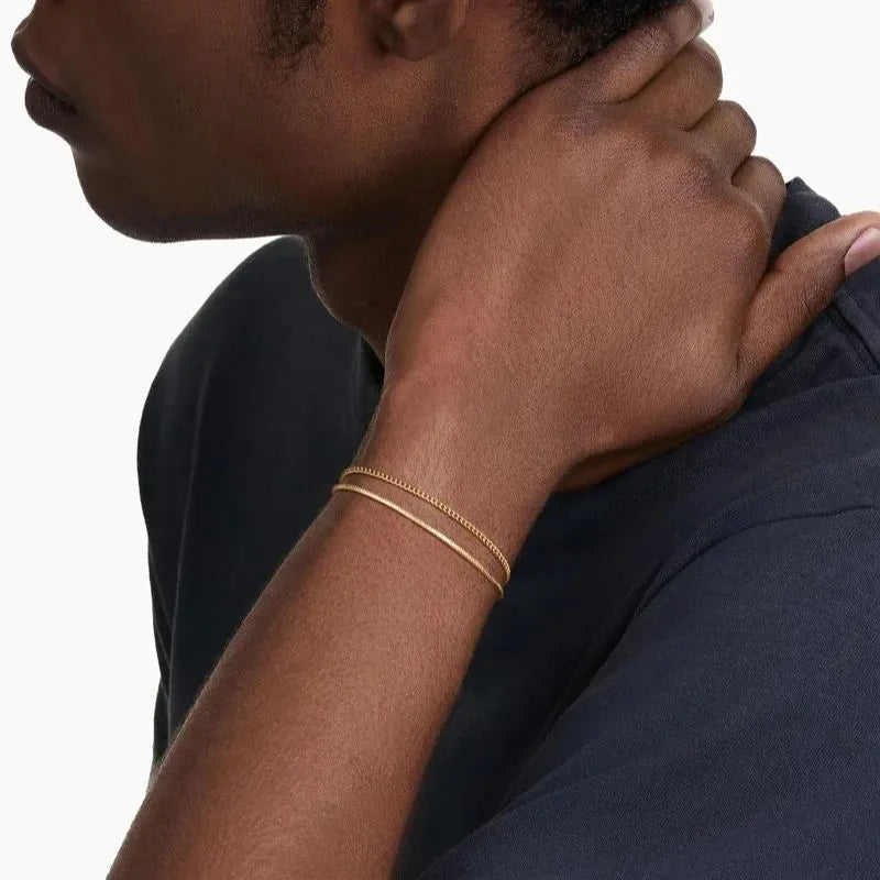 Minimalist 14K gold plated bracelet set combining a sleek snake chain and refined Cuban-inspired chain.