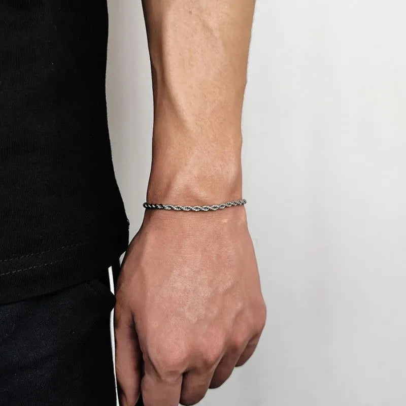Luxury rope chain bracelet featuring polished gold stainless steel links for sophisticated everyday fashion.