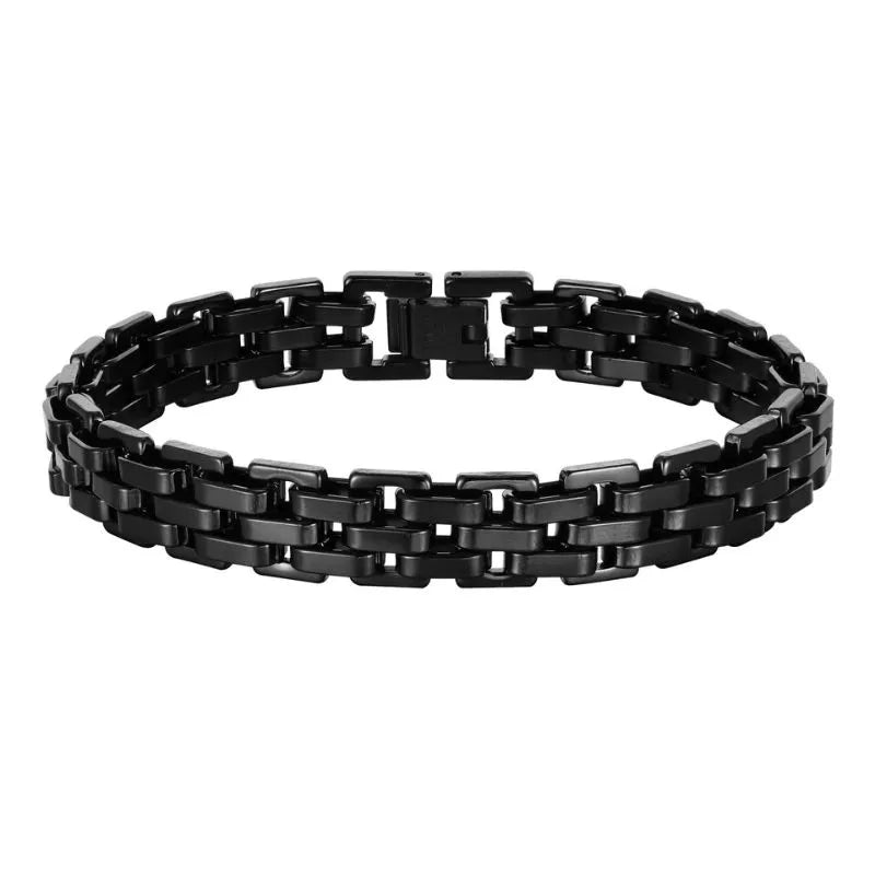 Gold watchband-link bracelet laid in an oval on a plain white background.