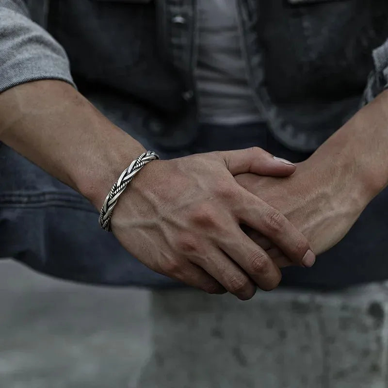 Detailed view of the Artisan Twisted Cuff Bracelet highlighting the braided sterling silver texture and handcrafted finish.