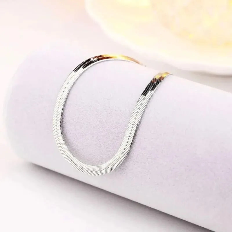 Eclipse Blade Chain Bracelet showcasing a minimalist 925 sterling silver design for everyday elegance.