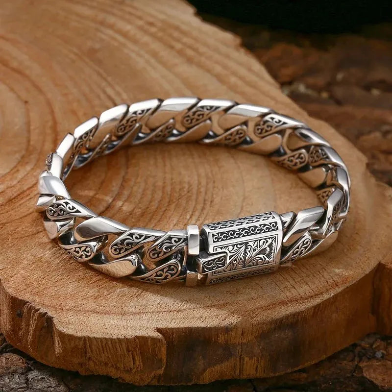 Detailed view of the Monarch Heritage Cuban Bracelet showcasing intricate vintage vine engravings.