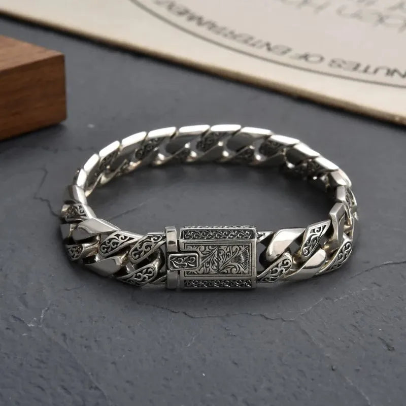 Heavy 925 sterling silver Cuban bracelet with vintage engravings and premium polished finish.