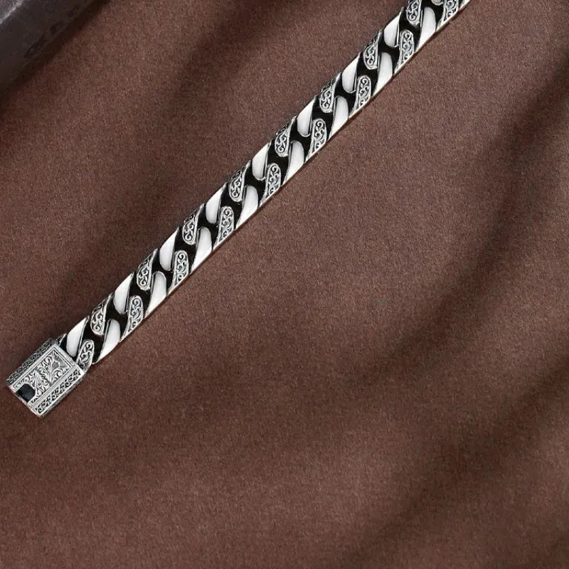 Monarch Heritage Cuban Bracelet with intricate engraved links and authentic 925 sterling silver construction.