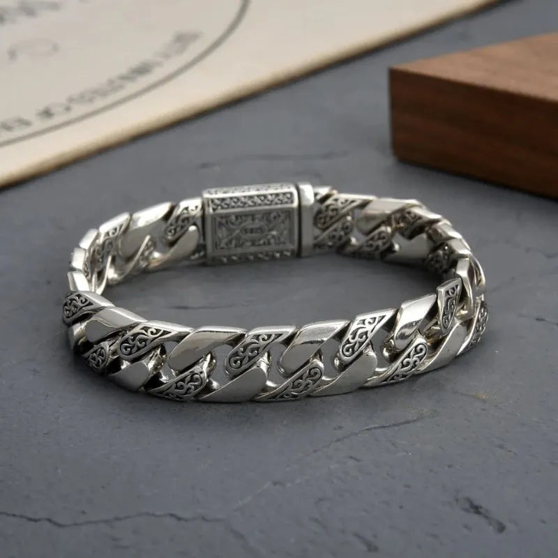 Close-up of the engraved clasp on the Monarch Heritage Cuban Bracelet in genuine 925 sterling silver.